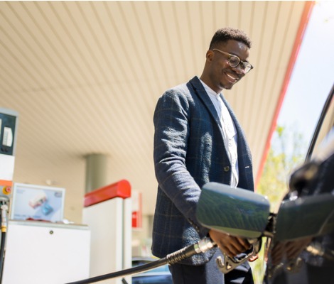Man pumping gas