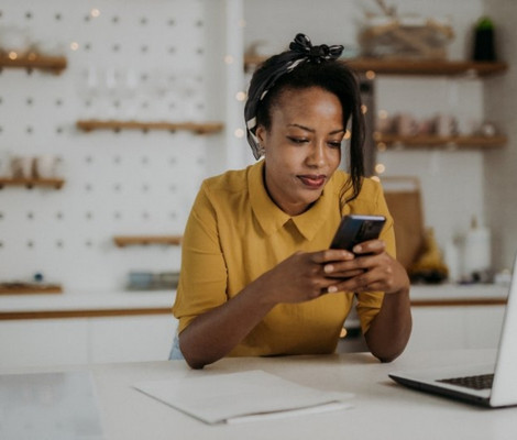 Woman looking at cell phone.