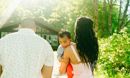 Family walking up to house.