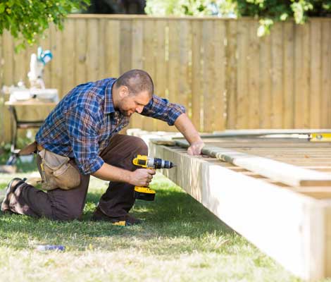 homeowner builds a deck on his property