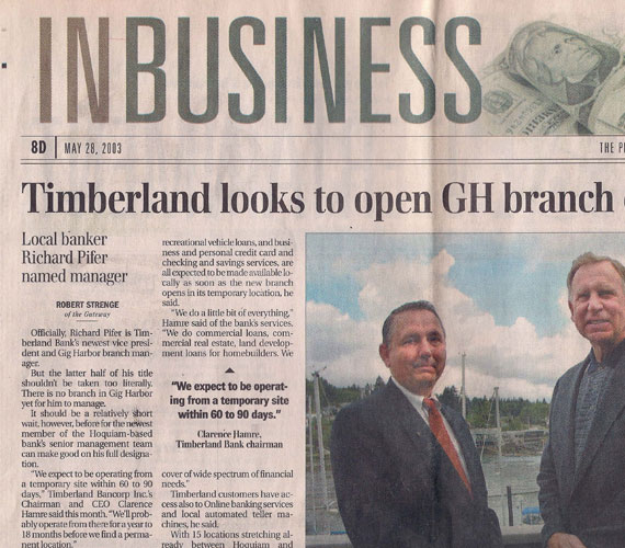 Newspaper clipping with headline reading "Timberland looks to open GH (Gig Harbor) branch"