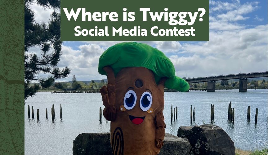 Tree mascot waving at the camera. 