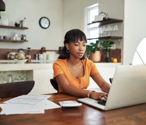 woman typing on a computer